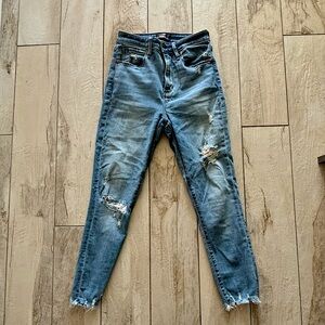 High waisted skinny jeans, with distressed areas